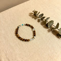 A harmony of Agarwood and natural gemstones
