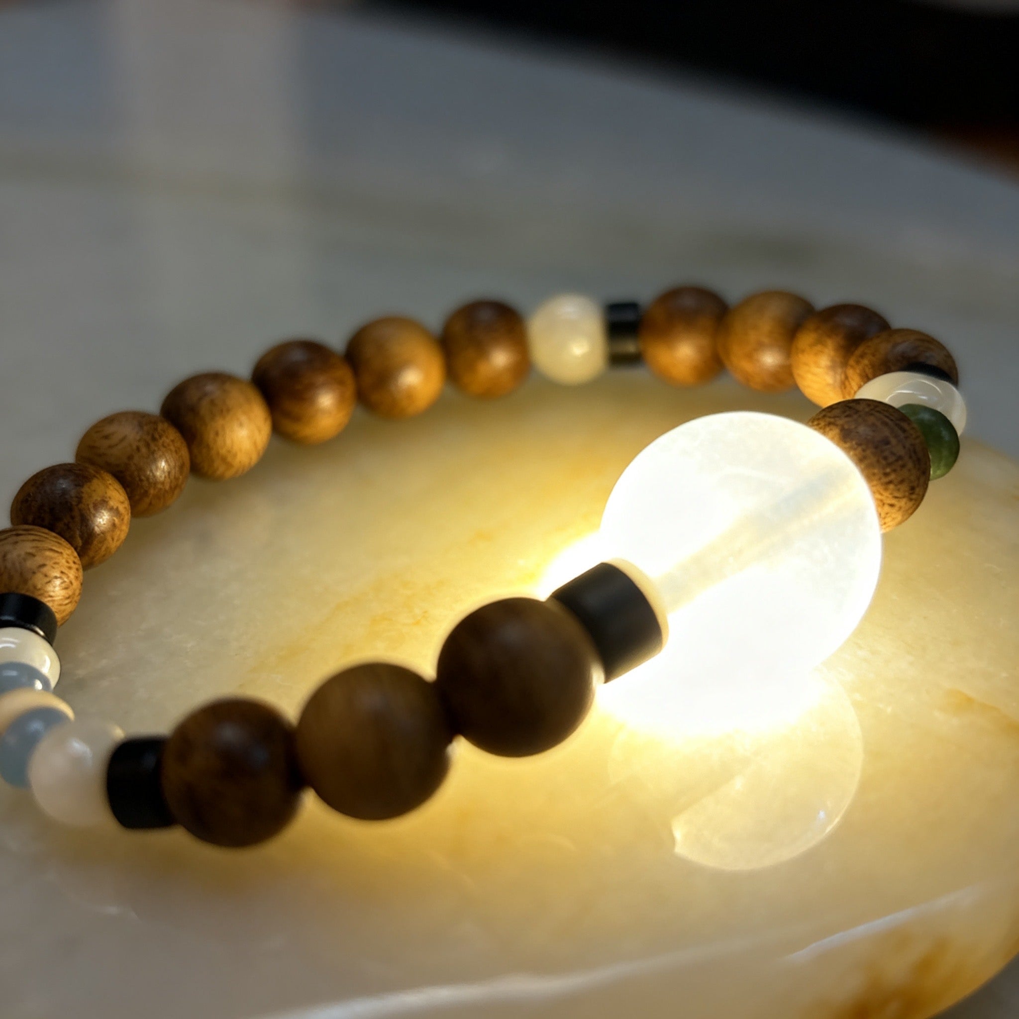 A harmony of Agarwood and natural gemstones